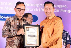 Pj Bupati Muara Enim Terima Penghargaan Adinkes