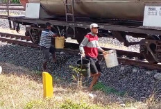 Video Viral,  Diduga Maling Minyak Tangki Pertamina di Jalur Rel Kereta Api