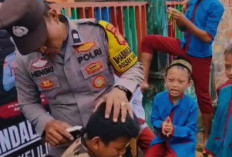 Polsek Sanga Desa Hadirkan Kepedulian, Cukur Rambut Gratis untuk Siswa SDN Ngunang
