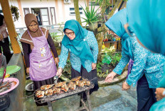 Perkuat Semangat Ketahanan Pangan dari Desa, Ketua TP PKK Muba Tinjau Panen Padi Organik dan Ikan Nila 