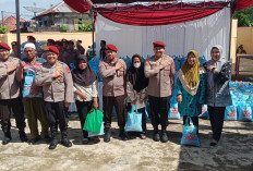 HUT ke-78 Reserse, Polda Sumsel Berbagi 300 Paket Bahan Pangan di Daerah Slum Area 9-10 Ulu