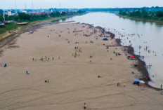 Pesona Pantai Bongen, Keindahan Sunset dan Hamparan Pasir di Sungai Musi