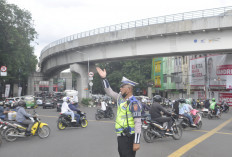 Kerahkan Personel Sat Lantas, Atasi Titik Kemacetan di Kota Palembang. 