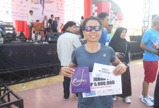 Helda Napitupulu Raih Juara 1 Kategori 10K Master di Musi Run Series V