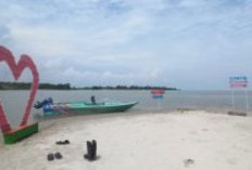 Pantai Tersembunyi di Bumi Bende Seguguk: Keindahan Pantai Tanjung Menjangan yang Menawan