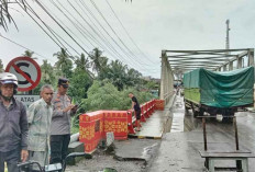 Hujan Deras Sebabkan Longsor di Pangkal Jembatan