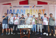 Guru SMAN 4 Palembang, Nia Rahma Sari Raih Hadiah Umrah di Jalan Sehat HUT Sumeks, Suasana Haru Pecah