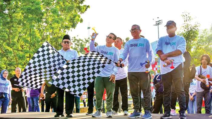 Meriah Ribuan Warga Ikuti Jalan Sehat BUMN di Palembang